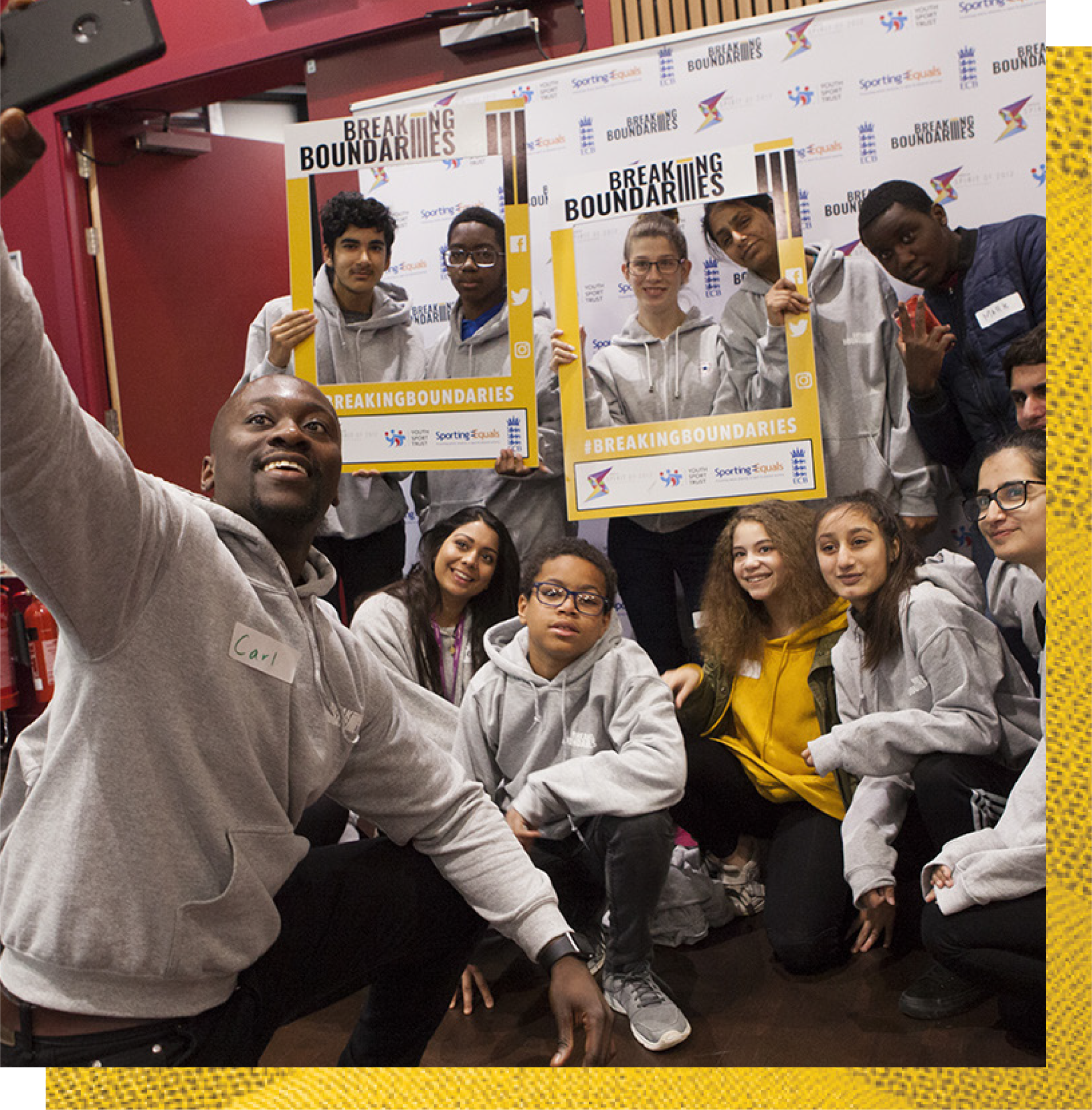 A group of people posing for an award 